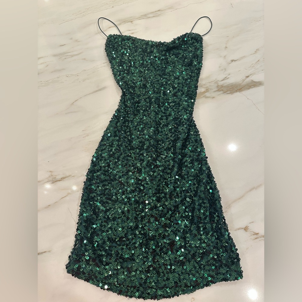 Green sequin woman’s mini dress size small from Windsor. New with tags.